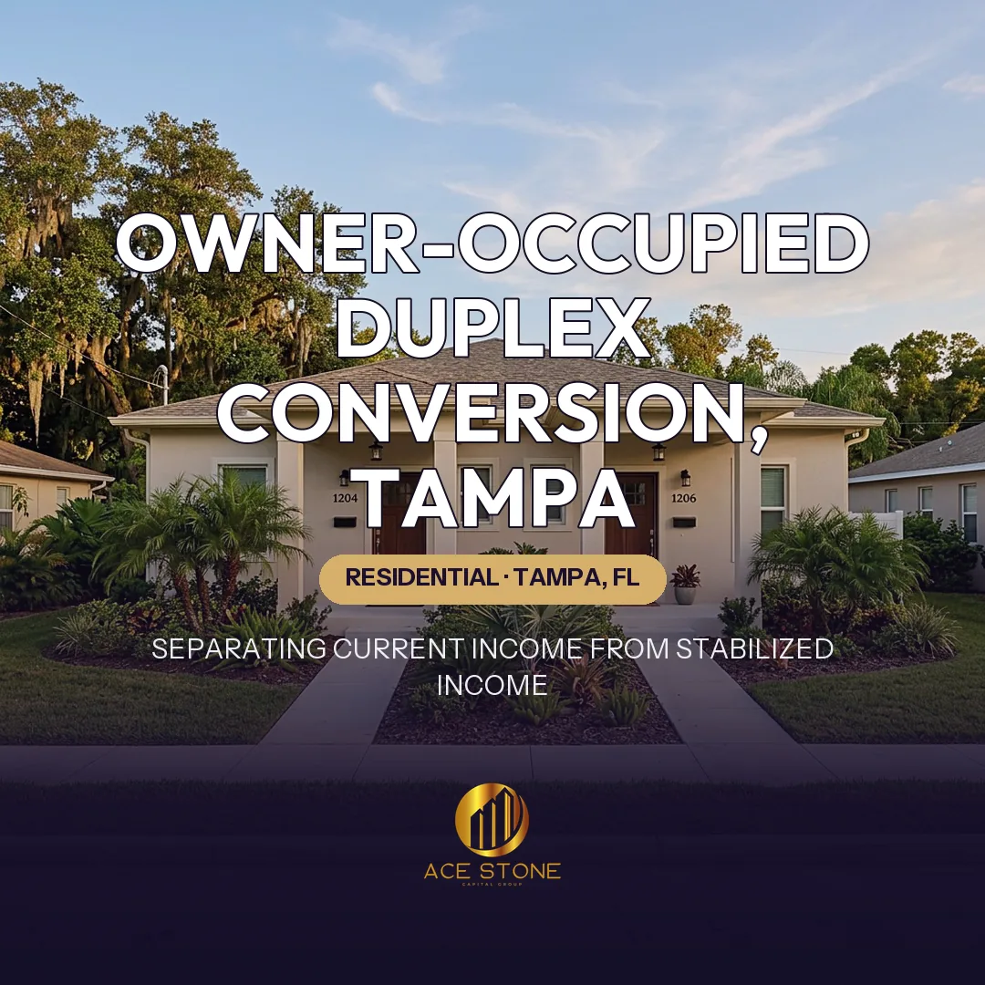 Side-by-side two-unit duplex with two entrances in a Tampa residential neighborhood.