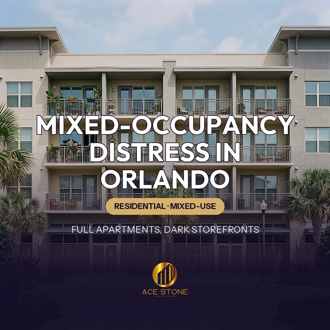 Orlando mixed-use building with occupied apartment balconies above and several vacant ground-floor storefronts.