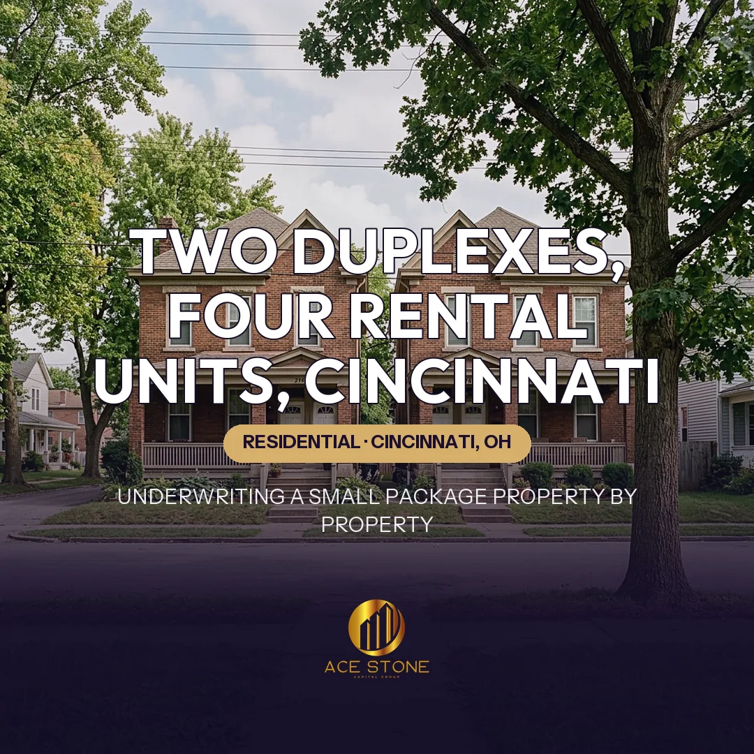 Two architecturally similar duplex buildings side by side on a Cincinnati street.